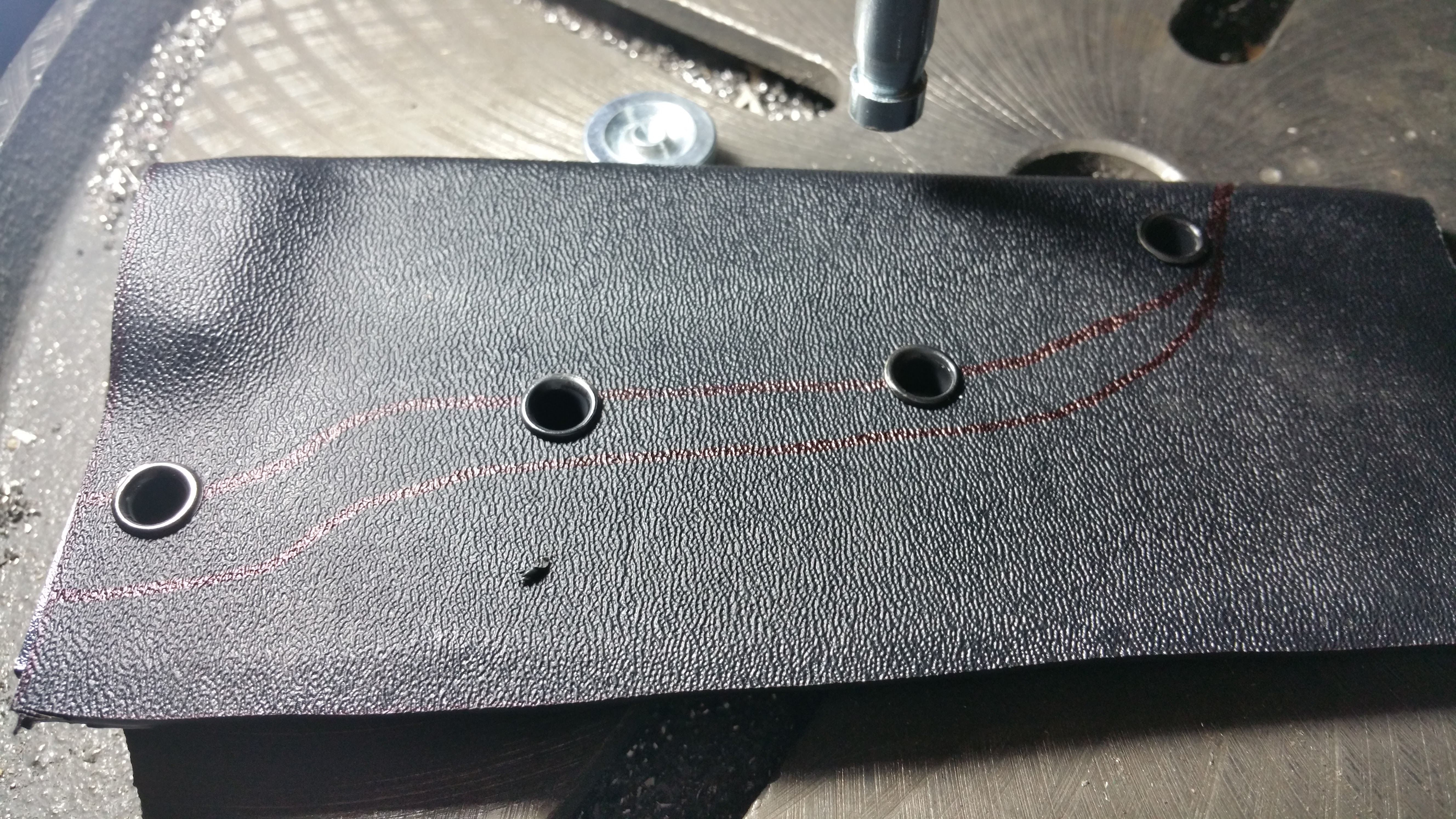 How to install kydex eyelets with a hand setter. 
