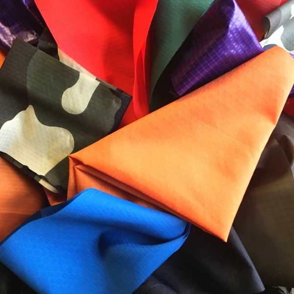 a collection of different camping fabrics