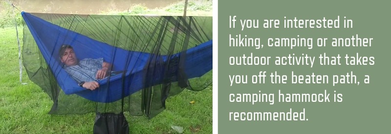 a man resting in a new camping hammock