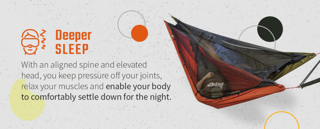 someone having a deep night of sleep in a camping hammock