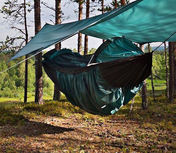 a clark hammock hanging in the woods