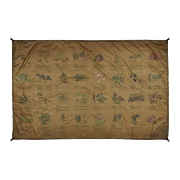 brown poly fabric cloth with plantlife prints on it used as a ground cover