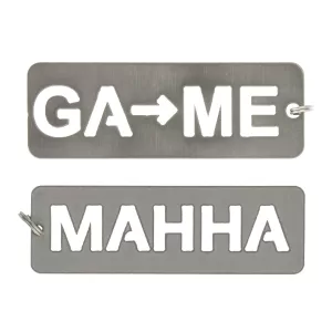 photo shows two rectangle "tags" often used as a necklace. One has "GA to ME" the other has "MAHHA"